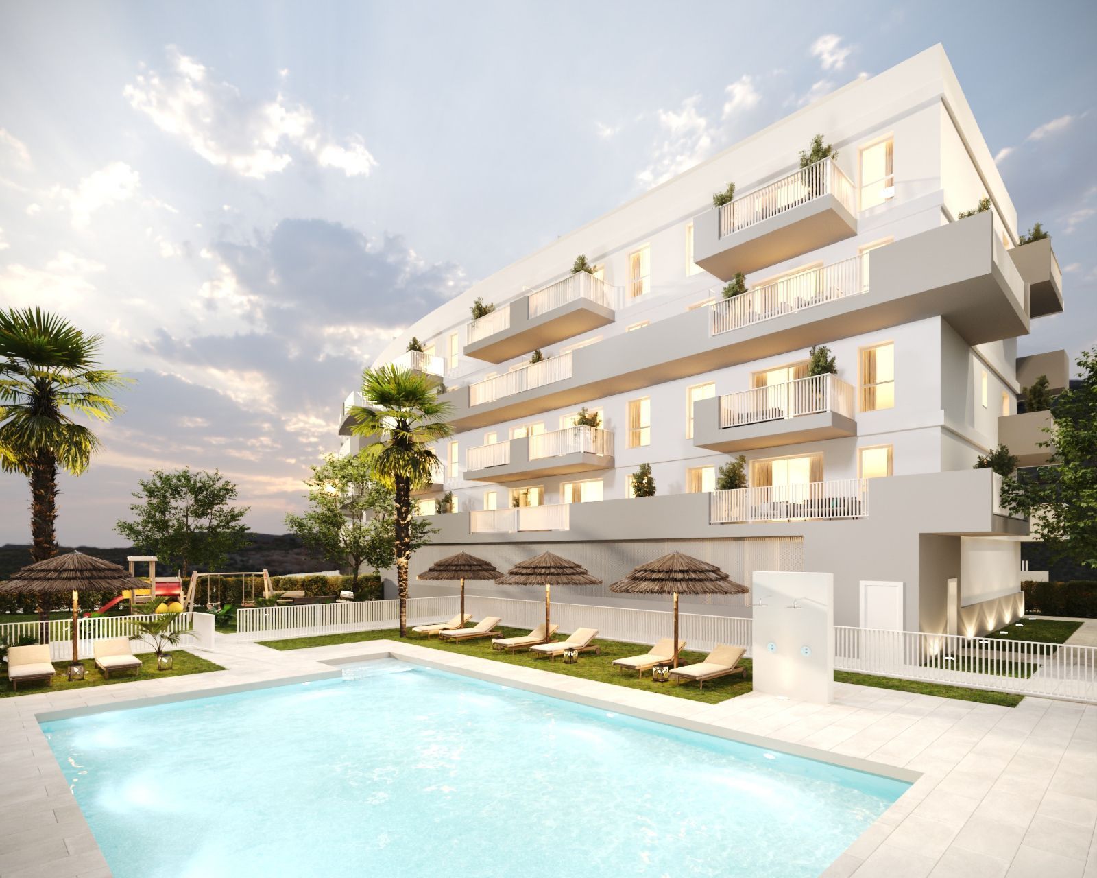 Modern apartment building with pool, lounge chairs, palm trees, and balconies at dusk.