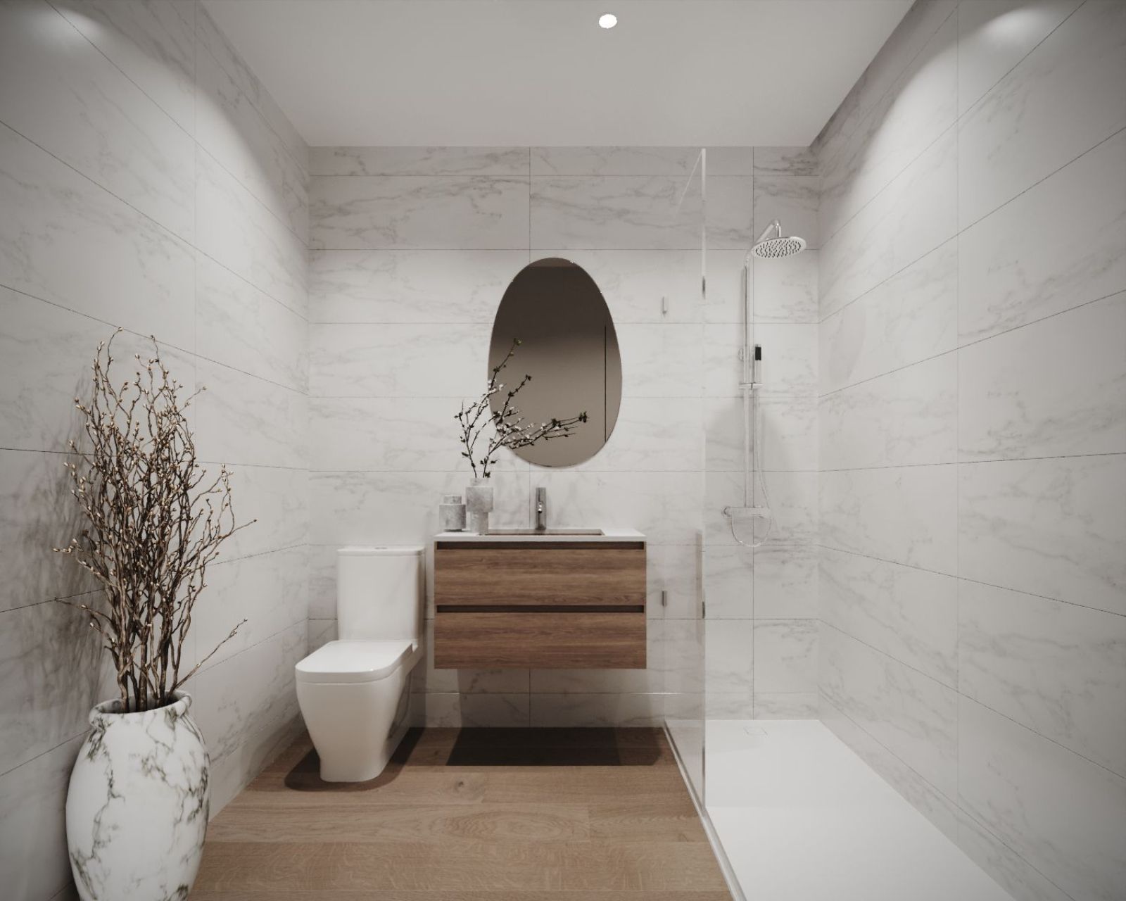 Modern bathroom with marble tiles, wooden vanity, oval mirror, and walk-in shower.